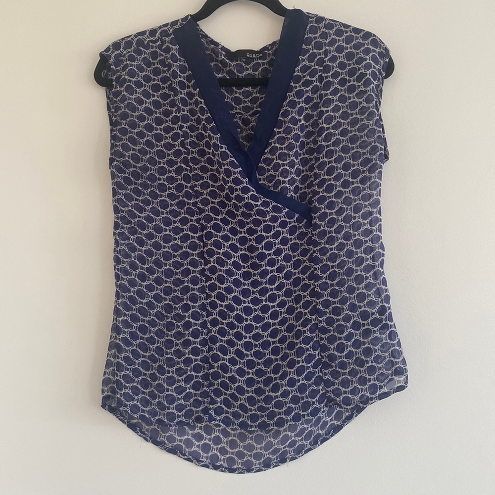 Sheer blue and white patterned blouse
